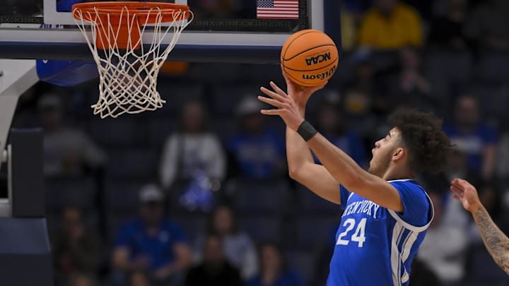 Mar 12, 2026; Nashville, TN, USA;  Kentucky Wildcats center Malachi Moreno (24) lays the ball in against the Missouri Tigers during the first half at Bridgestone Arena. Mandatory Credit: Steve Roberts-Imagn Images