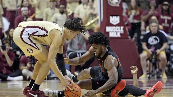 Mar 9, 2024; Tallahassee, Florida, USA; Miami Hurricanes forward Norchad Omier (15) dives for a