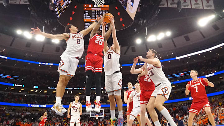 Mar 13, 2026; Chicago, IL, USA; Illinois Fighting Illini guard Andrej Stojakovic (2) David Mirkovic (0) defend Wisconsin Badgers guard John Blackwell (25) during the second half at United Center. 