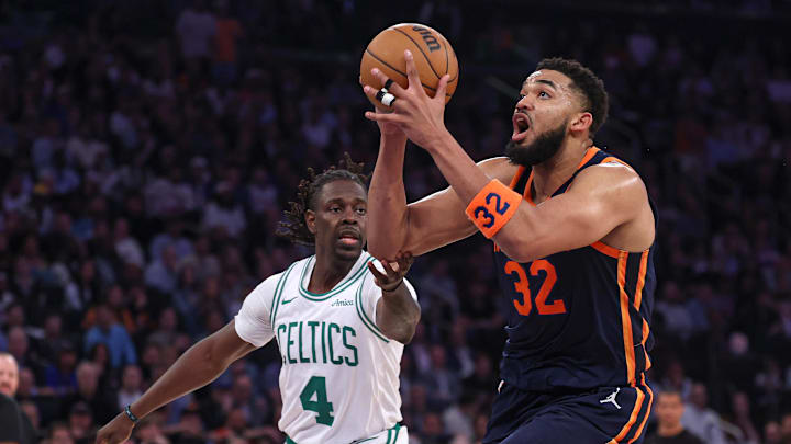 New York Knicks center Karl-Anthony Towns goes to the basket against Boston Celtics guard Jrue Holiday. Mandatory Credit: Vincent Carchietta-Imagn Images New York Knicks center Karl-Anthony Towns goes to the basket against Boston Celtics guard Jrue Holiday. Mandatory Credit: Vincent Carchietta-Imagn Images