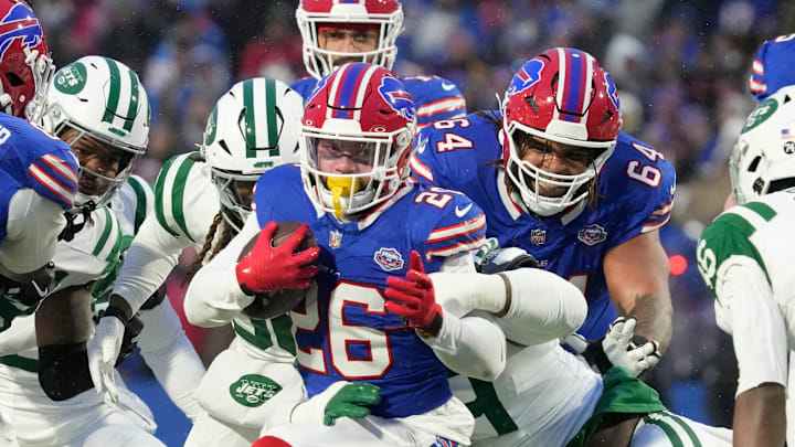 Bills running back Ty Johnson spins through a hole up the middle for yards against the Jets during the first half of their game at Highmark Stadium in Orchard Park Sunday, Jan. 4, 2026. Bills running back Ty Johnson spins through a hole up the middle for yards against the Jets during the first half of their game at Highmark Stadium in Orchard Park Sunday, Jan. 4, 2026.
