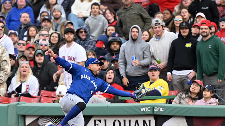 Toronto Blue Jays right fielder George Springer (4) makes a catch for an out against the Boston Red Sox during the sixth inning at Fenway Park on April 10.
