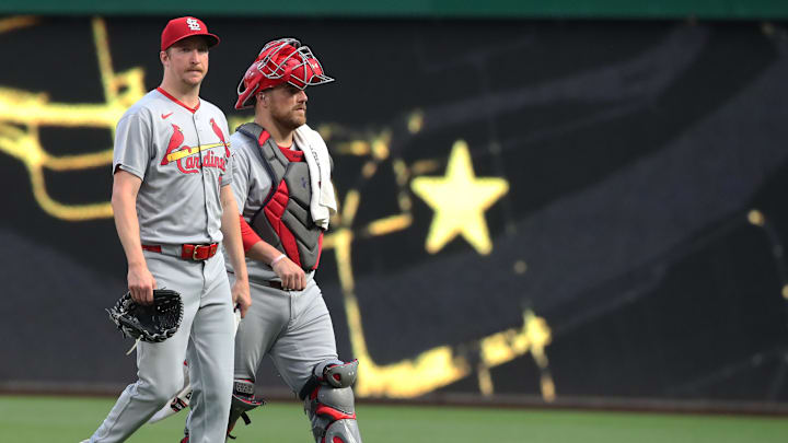 Jun 30, 2025; Pittsburgh, Pennsylvania, USA;  St. Louis Cardinals starting pitcher Erick Fedde (12) and catcher Pedro Pages (43) make their way in from the bullpen to play the Pittsburgh Pirates at PNC Park. Mandatory Credit: Charles LeClaire-Imagn Images