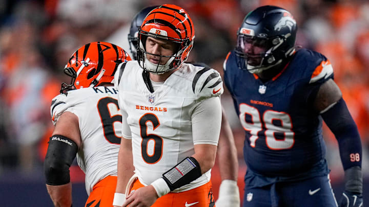 Cincinnati Bengals quarterback Jake Browning (6) reacts to a false start on guard Dylan Fairchild (63) in the fourth quarter of the NFL Week 4 Monday Night Football game between the Denver Broncos and the Cincinnati Bengals at Empower Field at Mile High in Denver on Monday, Sept. 29, 2025. The Bengals fell to 2-2 with a 28-3 loss to the Broncos.