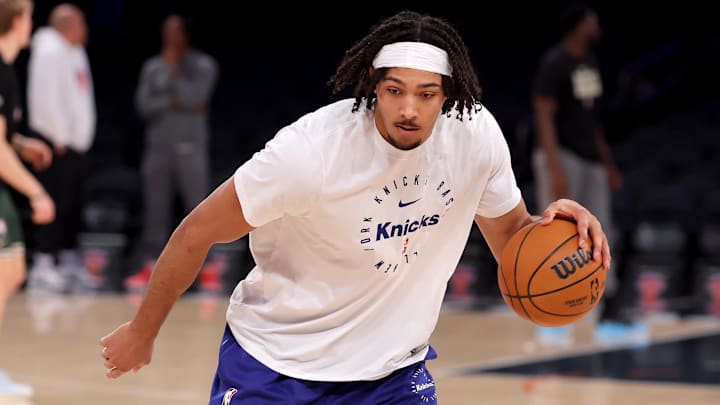 Jan 12, 2025; New York, New York, USA; New York Knicks center Jericho Sims (20) warms up before a game against the Milwaukee Bucks at Madison Square Garden. Mandatory Credit: Brad Penner-Imagn Images