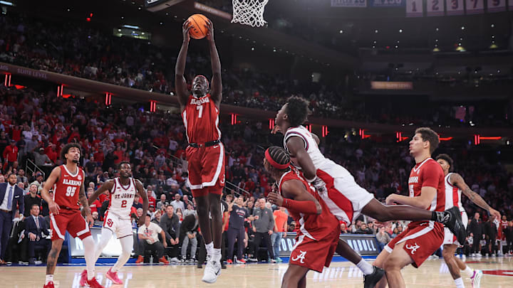 Nov 8, 2025; New York, New York, USA;  Alabama Crimson Tide forward Taylor Bol Bowen (7) grabs a rebound in the second half against the St. John's Red Storm at Madison Square Garden. 