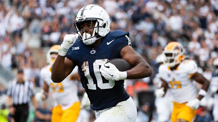 Penn State running back Nick Singleton (10) runs to the end zone to score a touchdown on a 17-yard reception in the first half of an NCAA football game against Kent State, Saturday, Sept. 21, 2024, in State College, Pa.