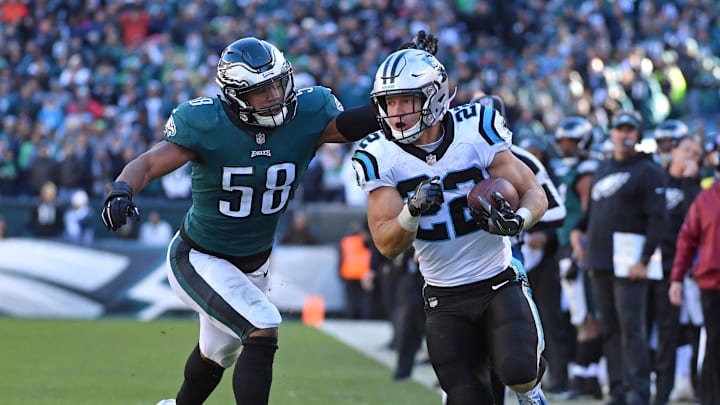 Oct 21, 2018; Philadelphia, PA, USA; Carolina Panthers running back Christian McCaffrey (22) is chased down the sidelines by Philadelphia Eagles linebacker Jordan Hicks (58) during the fourth quarter at Lincoln Financial Field. Mandatory Credit: Eric Hartline-Imagn Images