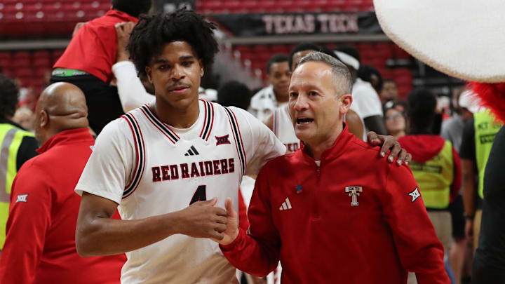 Feb 24, 2026; Lubbock, Texas, USA; Texas Tech Red Raiders head coach Grant McCasland and guard Christian Anderson (4) after a game against the Cincinnati Bearcats at United Supermarkets Arena. Mandatory Credit: Michael C. Johnson-Imagn Images