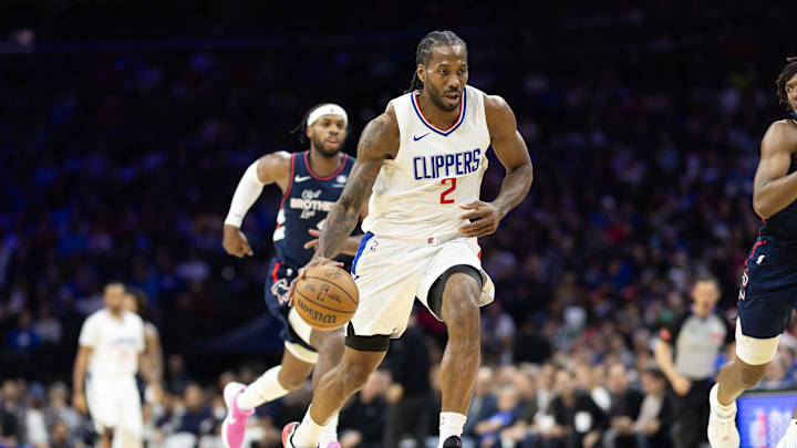 Mar 27, 2024; Philadelphia, Pennsylvania, USA; LA Clippers forward Kawhi Leonard (2) dribbles the ball Philadelphia 76ers during the third quarter at Wells Fargo Center. Mandatory Credit: Bill Streicher-Imagn Images
