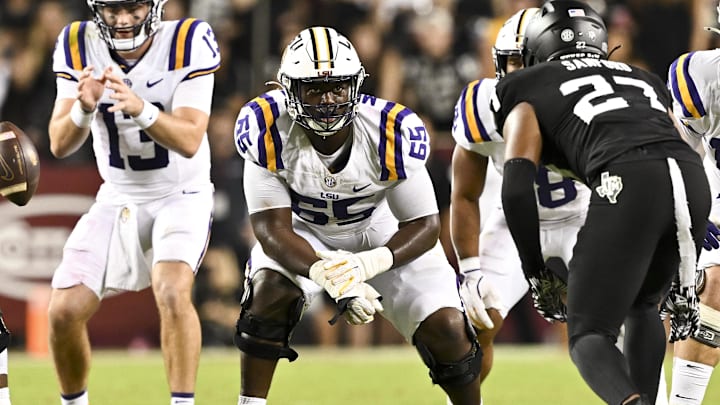 LSU Tigers offensive lineman Paul Mubenga (65) lines up during the second half against the Texas A&M Aggies. The Aggies defeated the Tigers 38-23 at Kyle Field. 
