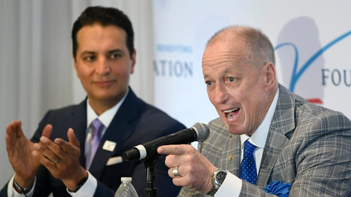 ESPN's SportsCenter anchor Kevin Negandhi looks on as NFL Hall of Famer Jim Kelly, talks about beating cancer. The 19th annual Dick Vitale Gala continues to raise awareness of children who have battled cancer over the years.