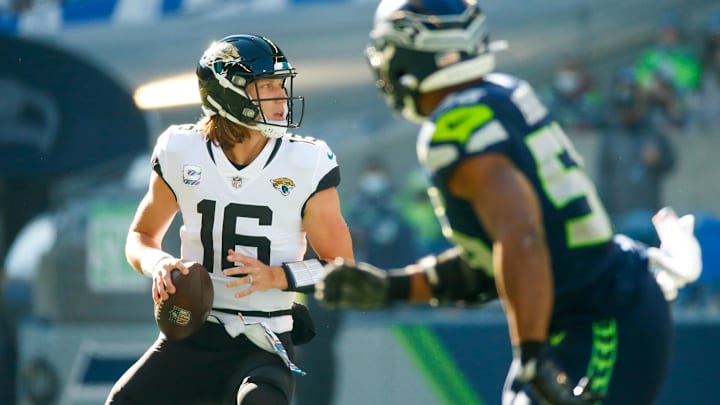 Oct 31, 2021; Seattle, Washington, USA; Jacksonville Jaguars quarterback Trevor Lawrence (16) looks to pass against the Seattle Seahawks during the first quarter at Lumen Field. Mandatory Credit: Joe Nicholson-Imagn Images