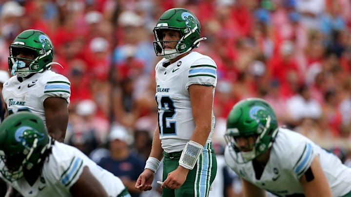Sep 20, 2025; Oxford, Mississippi, USA; Tulane Green Wave quarterback Jake Retzlaff (12) looks on during the second quarter against the Mississippi Rebels at Vaught-Hemingway Stadium. Mandatory Credit: Petre Thomas-Imagn Images Sep 20, 2025; Oxford, Mississippi, USA; Tulane Green Wave quarterback Jake Retzlaff (12) looks on during the second quarter against the Mississippi Rebels at Vaught-Hemingway Stadium. Mandatory Credit: Petre Thomas-Imagn Images