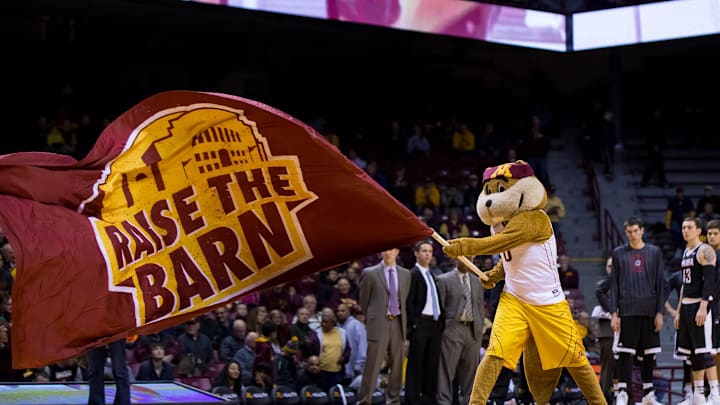 Nov 27, 2015; Minneapolis, MN, USA; Minnesota Gophers mascot Goldy Gopher waves the raise the barn flag before the game against the Omaha Mavericks at Williams Arena. Mandatory Credit: Brad Rempel-Imagn Images Nov 27, 2015; Minneapolis, MN, USA; Minnesota Gophers mascot Goldy Gopher waves the raise the barn flag before the game against the Omaha Mavericks at Williams Arena. Mandatory Credit: Brad Rempel-Imagn Images