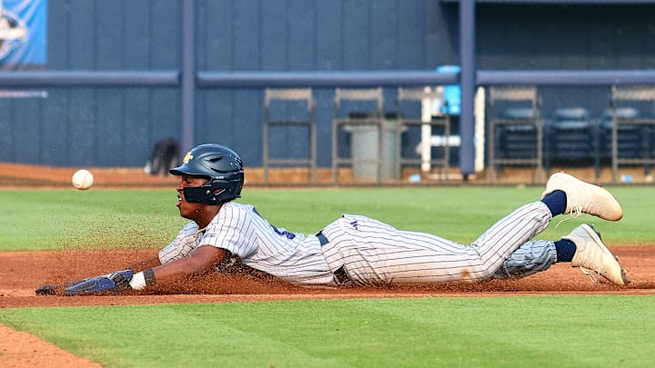 May 31, 2025; Oxford, MS, USA; Georgia Tech Yellowjackets catcher Vahn Lackey (25) slides into second base during the first inning against the Murray State Racers. Mandatory Credit: Petre Thomas-Imagn Images May 31, 2025; Oxford, MS, USA; Georgia Tech Yellowjackets catcher Vahn Lackey (25) slides into second base during the first inning against the Murray State Racers. Mandatory Credit: Petre Thomas-Imagn Images