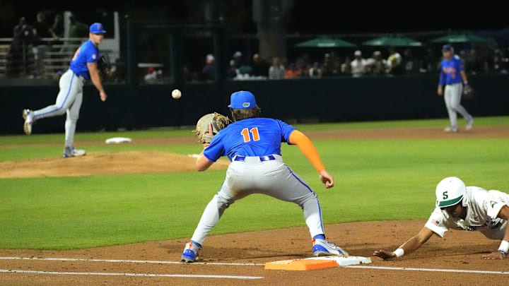 Florida first baseman Brendan Lawson waits for a throw