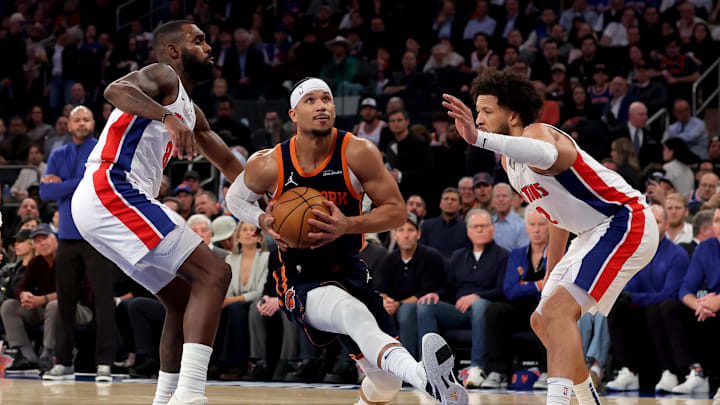 Apr 21, 2025; New York, New York, USA; New York Knicks guard Josh Hart (3) drives to the basket against Detroit Pistons forward Tim Hardaway Jr. (8) and guard Cade Cunningham (2) during the third quarter of game two of the first round of the 2024 NBA Playoffs at Madison Square Garden. Mandatory Credit: Brad Penner-Imagn Images