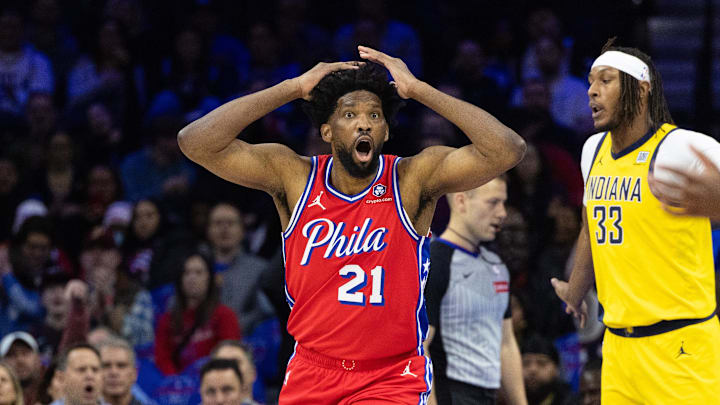 Dec 13, 2024; Philadelphia, Pennsylvania, USA; Philadelphia 76ers center Joel Embiid (21) reacts to a play against the Indiana Pacers during the first quarter at Wells Fargo Center. Mandatory Credit: Bill Streicher-Imagn Images