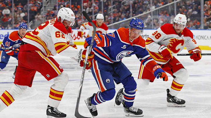 Sep 21, 2025; Edmonton, Alberta, CAN; Edmonton Oilers forward Viljami Marjala (57) carries the puck past Calgary Flames defensemen Daniil Miromanov (62) during the third period of the Edmonton Oilers at Rogers Place. Mandatory Credit: Perry Nelson-Imagn Images Sep 21, 2025; Edmonton, Alberta, CAN; Edmonton Oilers forward Viljami Marjala (57) carries the puck past Calgary Flames defensemen Daniil Miromanov (62) during the third period of the Edmonton Oilers at Rogers Place. Mandatory Credit: Perry Nelson-Imagn Images
