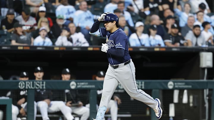 Tampa Bay Rays first baseman Austin Shenton (54) rounds the bases after hitting a solo home run against the Chicago White Sox during the fifth inning at Guaranteed Rate Field in 2024.
