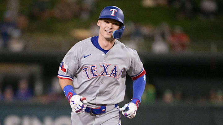 Aug 29, 2025; West Sacramento, California, USA; Texas Rangers outfielder Michael Helman (24) rounds the bases after hitting a home run against the Athletics dseventh inning at Sutter Health Park. Mandatory Credit: Ed Szczepanski-Imagn Images