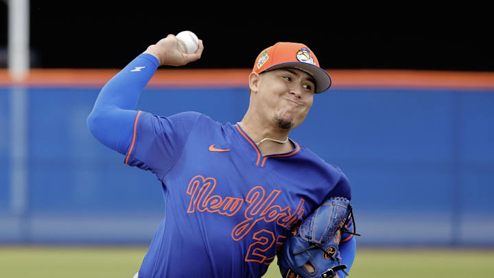 Feb 18, 2026; Port St. Lucie, FL, USA;  New York Mets pitcher Carlos Guzman (27) throws a pitch during spring training workouts at Clover Park. Mandatory Credit: Reinhold Matay-Imagn Images