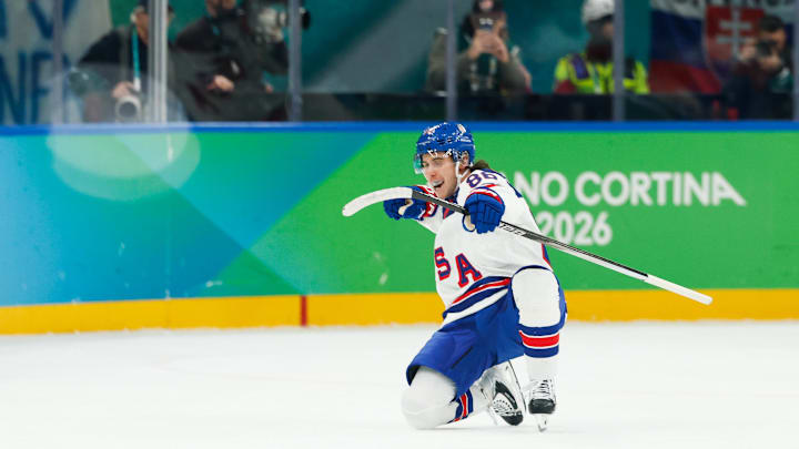 Feb 20, 2026; Milan, Italy; Jack Hughes (86) of the United States celebrates after scoring a goal during the second period against Slovakia in a men's ice hockey semifinal during the Milano Cortina 2026 Olympic Winter Games at Milano Santagiulia Ice Hockey Arena. Mandatory Credit: Geoff Burke-Imagn Images