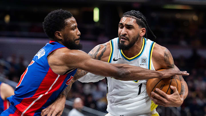 Jan 29, 2025; Indianapolis, Indiana, USA; Indiana Pacers forward Obi Toppin (1) dribbles the ball while Detroit Pistons guard Malik Beasley (5) defends in the first half at Gainbridge Fieldhouse. Mandatory Credit: Trevor Ruszkowski-Imagn Images