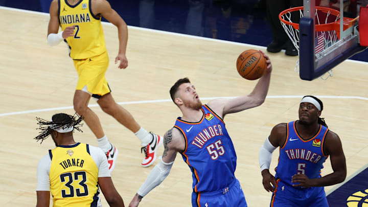 Jun 19, 2025; Indianapolis, Indiana, USA; Oklahoma City Thunder center Isaiah Hartenstein (55) rebounds against the Indiana Pacers in the first quarter during game six of the 2025 NBA Finals at Gainbridge Fieldhouse. Mandatory Credit: Trevor Ruszkowski-Imagn Images Jun 19, 2025; Indianapolis, Indiana, USA; Oklahoma City Thunder center Isaiah Hartenstein (55) rebounds against the Indiana Pacers in the first quarter during game six of the 2025 NBA Finals at Gainbridge Fieldhouse. Mandatory Credit: Trevor Ruszkowski-Imagn Images