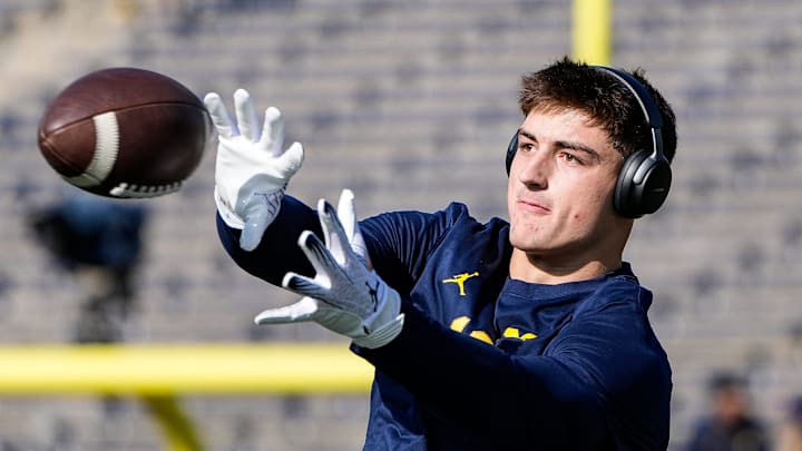 Michigan tight end Colston Loveland (18) warms up before the Oregon game at Michigan Stadium in Ann Arbor on Saturday, Nov. 2, 2024.
