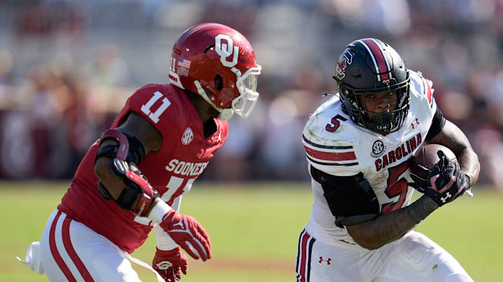 Oklahoma Sooners linebacker Kobie McKinzie (11) chases after South Carolina Gamecocks running back Raheim Sanders (5) during a college football game between the University of Oklahoma Sooners (OU) and the South Carolina Gamecocks at Gaylord Family - Oklahoma Memorial Stadium in Norman, Okla., Saturday, Oct. 19, 2024. Oklahoma Sooners linebacker Kobie McKinzie (11) chases after South Carolina Gamecocks running back Raheim Sanders (5) during a college football game between the University of Oklahoma Sooners (OU) and the South Carolina Gamecocks at Gaylord Family - Oklahoma Memorial Stadium in Norman, Okla., Saturday, Oct. 19, 2024.