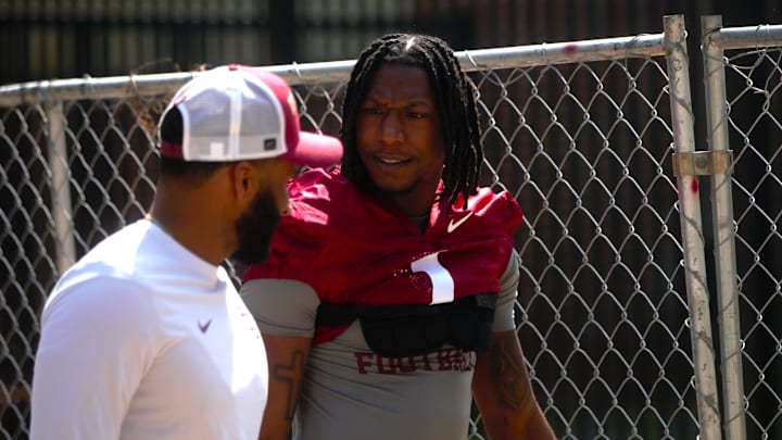 FSU football players walk into the first spring practice of the spring season on Wednesday, March 19, 2025