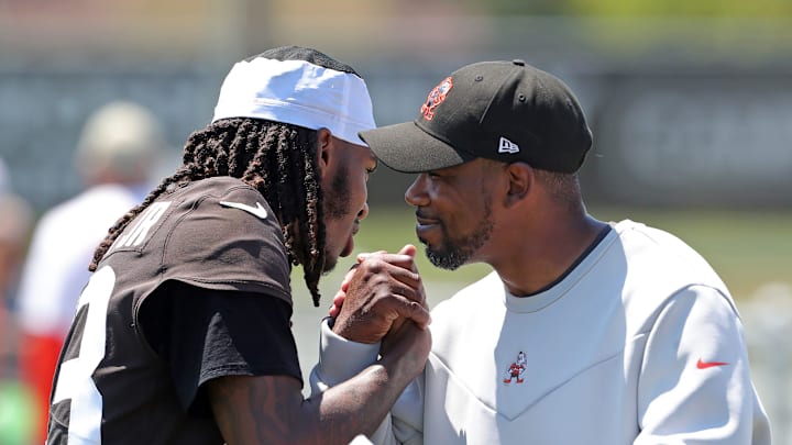 Browns cornerback Martin Emerson Jr. hugs cornerbacks coach Brandon Lynch after minicamp practice, Thursday, June 13, 2024, in Berea.