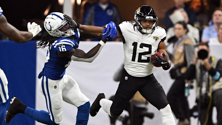 Jan 5, 2025; Indianapolis, Indiana, USA; Jacksonville Jaguars wide receiver Devin Duvernay (12) strong arms Indianapolis Colts wide receiver Ashton Dulin (16) during the second half at Lucas Oil Stadium. Mandatory Credit: Marc Lebryk-Imagn Images Jan 5, 2025; Indianapolis, Indiana, USA; Jacksonville Jaguars wide receiver Devin Duvernay (12) strong arms Indianapolis Colts wide receiver Ashton Dulin (16) during the second half at Lucas Oil Stadium. Mandatory Credit: Marc Lebryk-Imagn Images