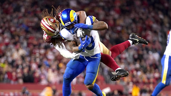 Dec 12, 2024; Santa Clara, California, USA; Los Angeles Rams running back Kyren Williams (23) is tackled by San Francisco 49ers linebacker Fred Warner (54) in the fourth quarter at Levi's Stadium. Mandatory Credit: Cary Edmondson-Imagn Images