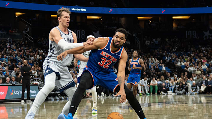 Dec 15, 2024; Orlando, Florida, USA; New York Knicks center Karl-Anthony Towns (32) dribbles the ball against Orlando Magic forward Moritz Wagner (21) in the second quarter at Kia Center. Mandatory Credit: Jeremy Reper-Imagn Images Dec 15, 2024; Orlando, Florida, USA; New York Knicks center Karl-Anthony Towns (32) dribbles the ball against Orlando Magic forward Moritz Wagner (21) in the second quarter at Kia Center. Mandatory Credit: Jeremy Reper-Imagn Images