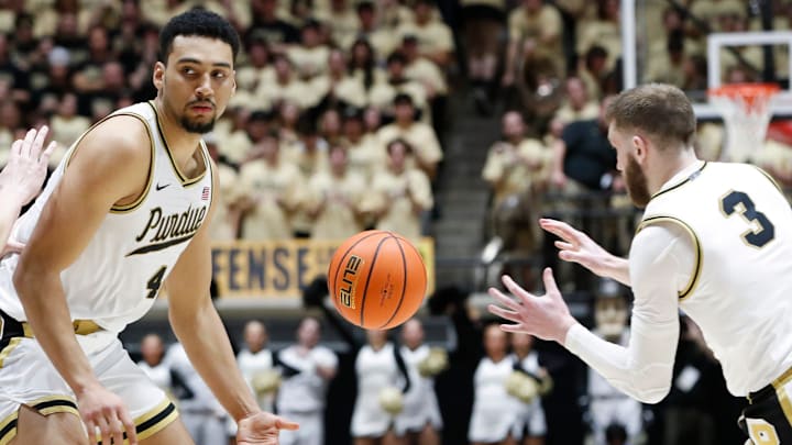 Purdue Boilermakers forward Trey Kaufman-Renn (4) passes the ball to guard Braden Smith (3)