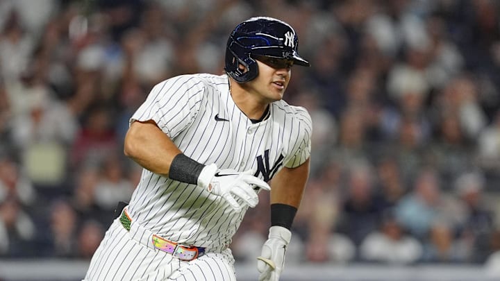 New York Yankees left fielder Jasson Dominguez (89) runs out a single against the Boston Red Sox during the second inning at Yankee Stadium.