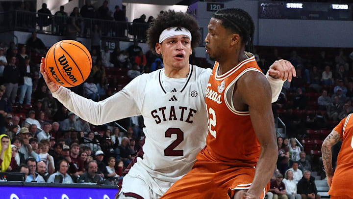 Mar 4, 2025; Starkville, Mississippi, USA; Mississippi State Bulldogs guard Riley Kugel (2) drives to the basket as Texas Longhorns guard Tramon Mark (12) defends during overtime at Humphrey Coliseum. Mandatory Credit: Petre Thomas-Imagn Images Mar 4, 2025; Starkville, Mississippi, USA; Mississippi State Bulldogs guard Riley Kugel (2) drives to the basket as Texas Longhorns guard Tramon Mark (12) defends during overtime at Humphrey Coliseum. Mandatory Credit: Petre Thomas-Imagn Images