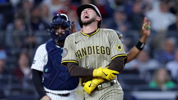 May 7, 2025; Bronx, New York, USA; San Diego Padres center fielder Jackson Merrill (3) reacts after being hit in the arm by a pitch during the tenth inning against the New York Yankees at Yankee Stadium. Mandatory Credit: Brad Penner-Imagn Images May 7, 2025; Bronx, New York, USA; San Diego Padres center fielder Jackson Merrill (3) reacts after being hit in the arm by a pitch during the tenth inning against the New York Yankees at Yankee Stadium. Mandatory Credit: Brad Penner-Imagn Images