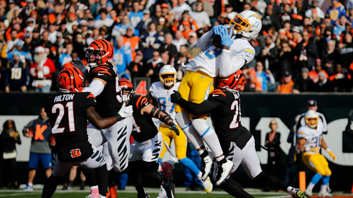 Los Angeles Chargers wide receiver Keenan Allen (13) makes a leaping catch for a touchdown on the opening drive of the first quarter of the NFL Week 13 game between the Cincinnati Bengals and the Los Angeles Chargers at Paul Brown Stadium in Cincinnati on Sunday, Dec. 5, 2021. The Chargers led 24-13 at halftime.

Los Angeles Chargers At Cincinnati Bengals