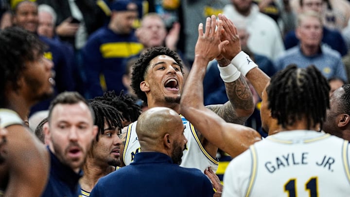 Michigan forward Yaxel Lendeborg (23) talks to Tennessee players after a play during the second half of NCAA Tournament Elite 8 round at United Center in Chicago on Sunday, March 29, 2026.