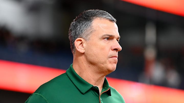 Nov 30, 2024; Syracuse, New York, USA; Miami Hurricanes head coach Mario Cristobal looks on prior to the game against the Syracuse Orange at the JMA Wireless Dome. Mandatory Credit: Rich Barnes-Imagn Images