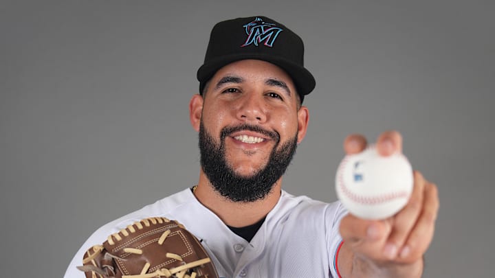Feb 22, 2023; Jupiter, FL, USA;  Miami Marlins pitcher Enmanuel De Jesus (83) poses for a photo during photo day at Roger Dean Chevrolet Stadium.