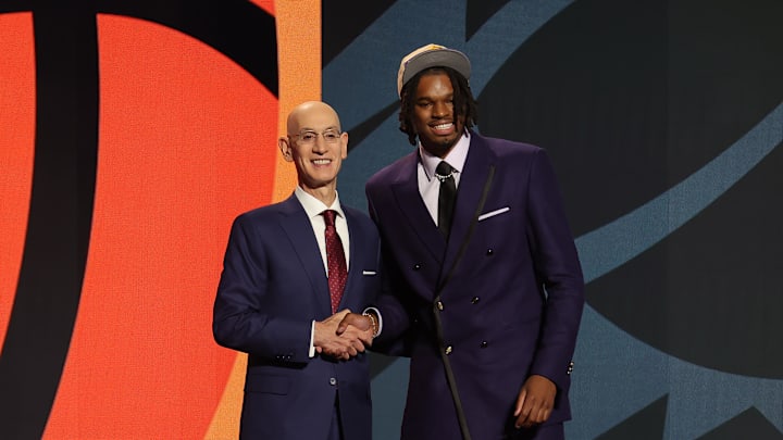Jun 26, 2024; Brooklyn, NY, USA; DaRon Holmes ll poses for photos with NBA commissioner Adam Silver after being selected in the first round by the Phoenix Suns in the 2024 NBA Draft at Barclays Center. Mandatory Credit: Brad Penner-Imagn Images Jun 26, 2024; Brooklyn, NY, USA; DaRon Holmes ll poses for photos with NBA commissioner Adam Silver after being selected in the first round by the Phoenix Suns in the 2024 NBA Draft at Barclays Center. Mandatory Credit: Brad Penner-Imagn Images