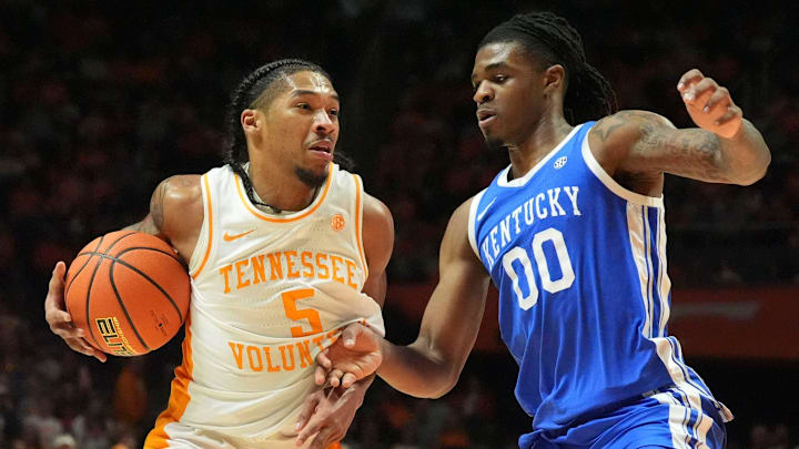 Tennessee's Zakai Zeigler (5) tries to get to the basket while guarded by Kentucky's Otega Oweh (0) during an NCAA college basketball game on Tuesday, Jan. 28, 2025, in Knoxville, Tenn. Tennessee's Zakai Zeigler (5) tries to get to the basket while guarded by Kentucky's Otega Oweh (0) during an NCAA college basketball game on Tuesday, Jan. 28, 2025, in Knoxville, Tenn.