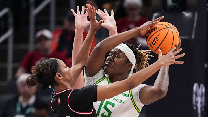 Oregon Ducks center Phillipina Kyei worked under the basket for 5 points and three rebounds in the first quarter, sparking the Ducks to a 12-9 lead as 14.5-point underdogs against Duke in Cameron Indoor Stadium.
