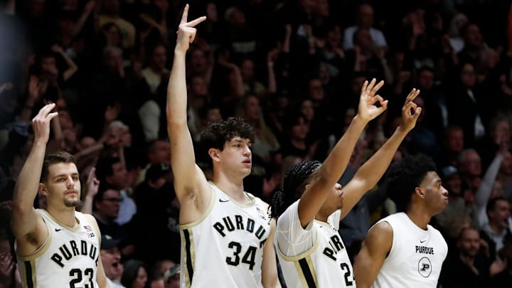 The Purdue Boilermakers bench reacts after a Purdue Boilermakers three-point shot 