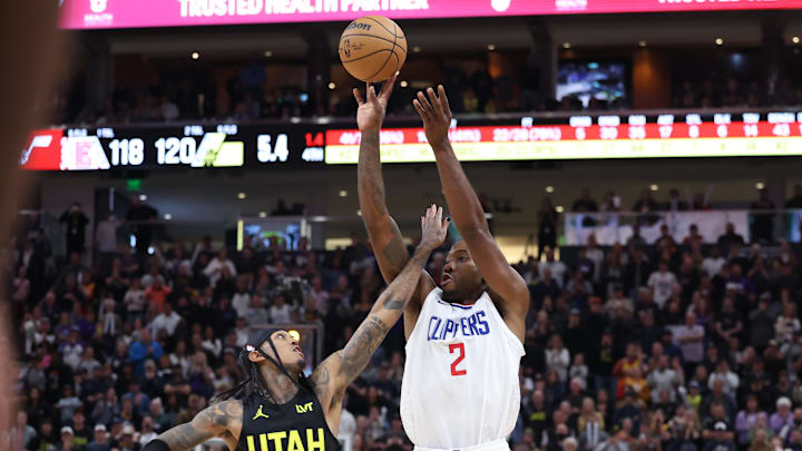 Oct 27, 2023; Salt Lake City, Utah, USA; Los Angeles Clippers forward Kawhi Leonard (2) attempts a three point shot over Utah Jazz guard Jordan Clarkson (00) in the final seconds of the game at the Delta Center. Mandatory Credit: Rob Gray-Imagn Images Oct 27, 2023; Salt Lake City, Utah, USA; Los Angeles Clippers forward Kawhi Leonard (2) attempts a three point shot over Utah Jazz guard Jordan Clarkson (00) in the final seconds of the game at the Delta Center. Mandatory Credit: Rob Gray-Imagn Images